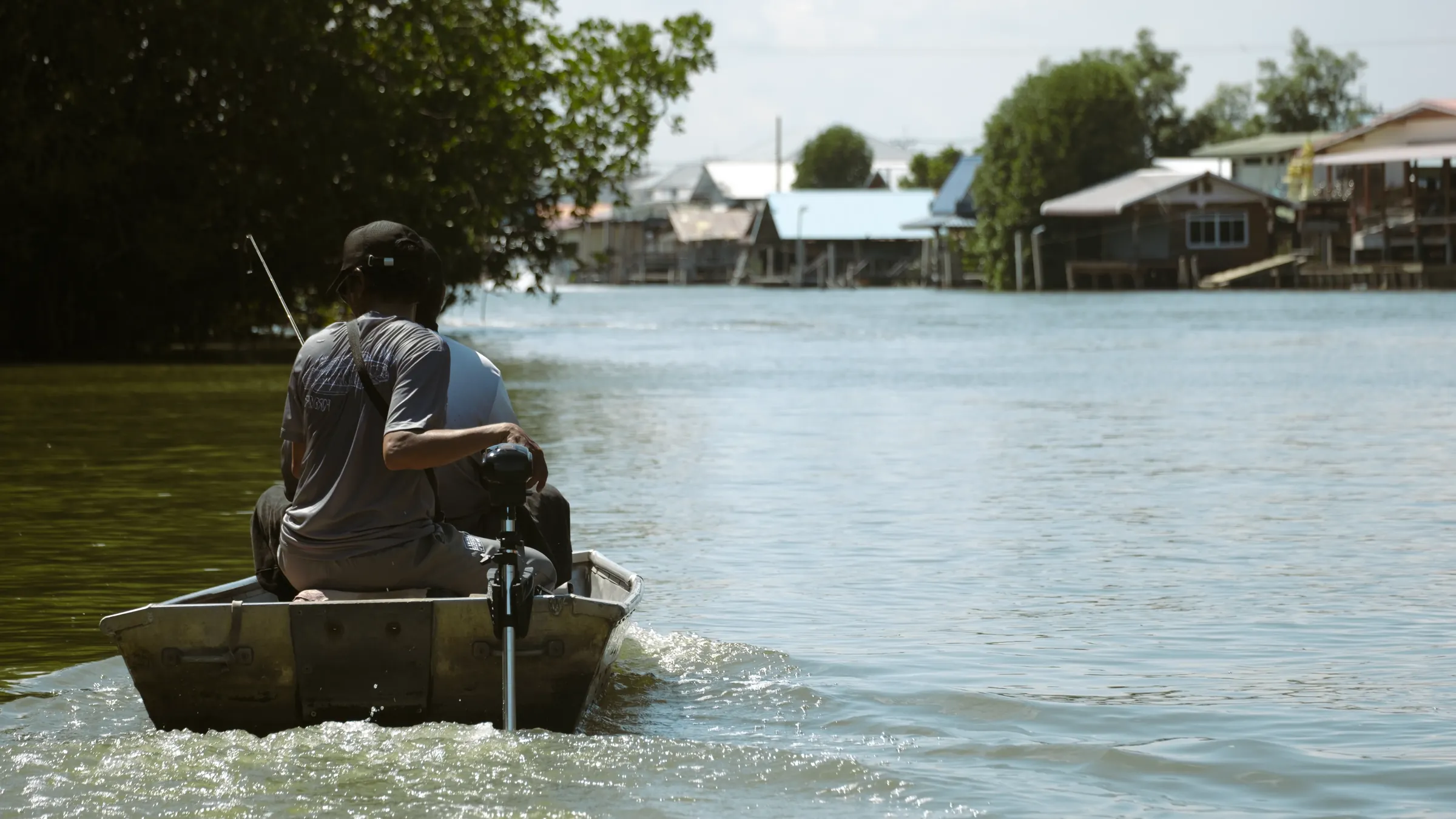 DELTA trolling motor boat cruising on the river