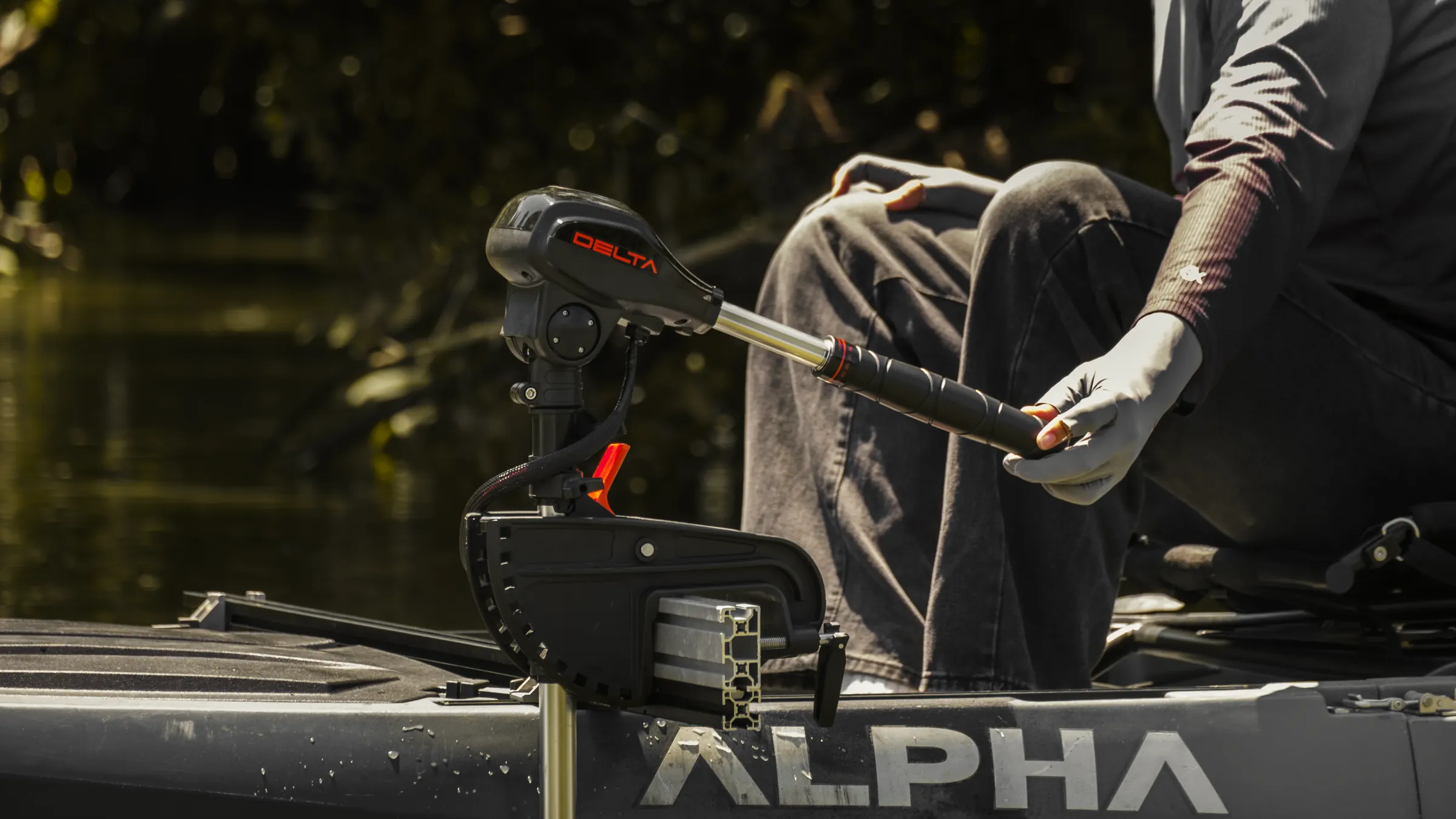 Close-up of the DELTA trolling motor tiller handle on an ALPHA boat